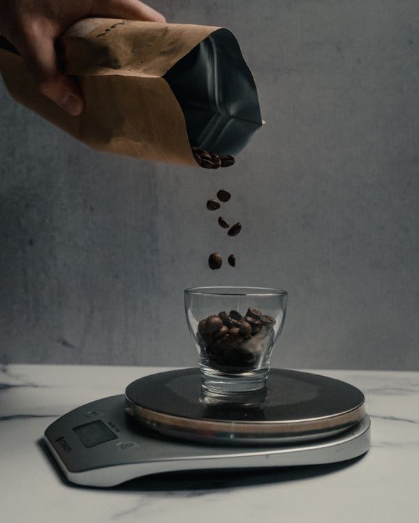 Pouring coffee beans